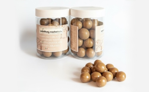 HAZELNUT DRAGEES COVERED WITH WHITE CHOCOLATE WITH CARAMEL 150 G